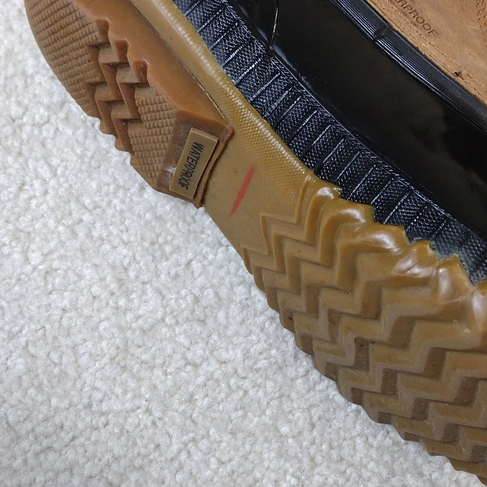 Sorel men's black rubber & tan leather winter boots. Size 11.5